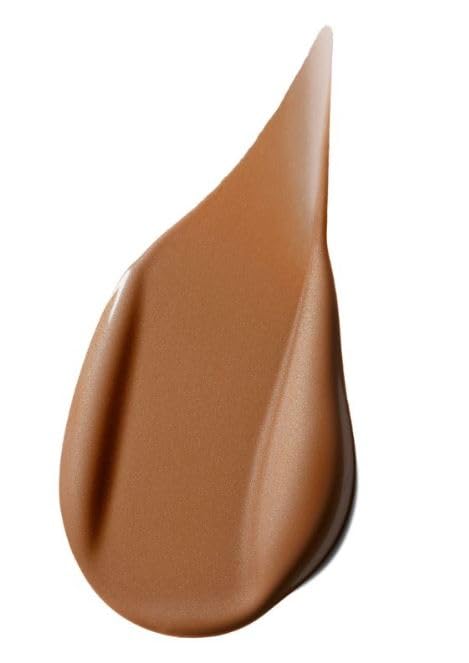 MAC Strobe Dewy Skin Tint swatch shows natural glow and sheer coverage.
