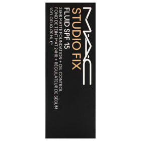 MAC Studio Fix Fluid SPF 15 application with brush demonstrates seamless blending.