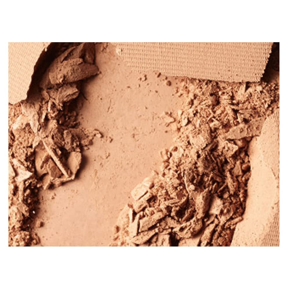 MAC Studio Fix Powder Plus Foundation NW33 packaging close-up highlights travel-friendly design