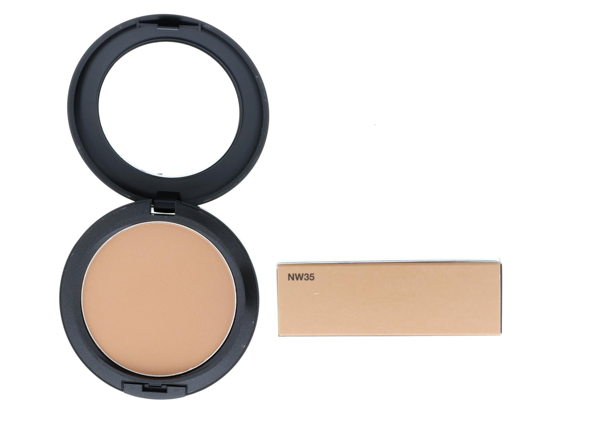MAC Studio Fix Powder Plus Foundation close-up reveals fine breathable texture.