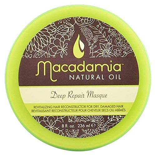 Macadamia Natural Oil Deep Repair Masque label closeup highlights nourishing formula for damaged strands