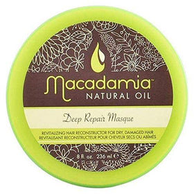 Macadamia Natural Oil Deep Repair Masque label closeup highlights nourishing formula for damaged strands