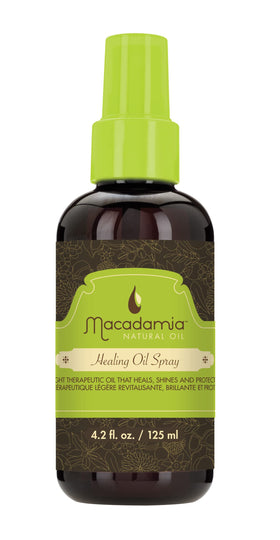 Macadamia Natural Oil Spray bottle on a dresser for lightweight nourishment on fine hair.