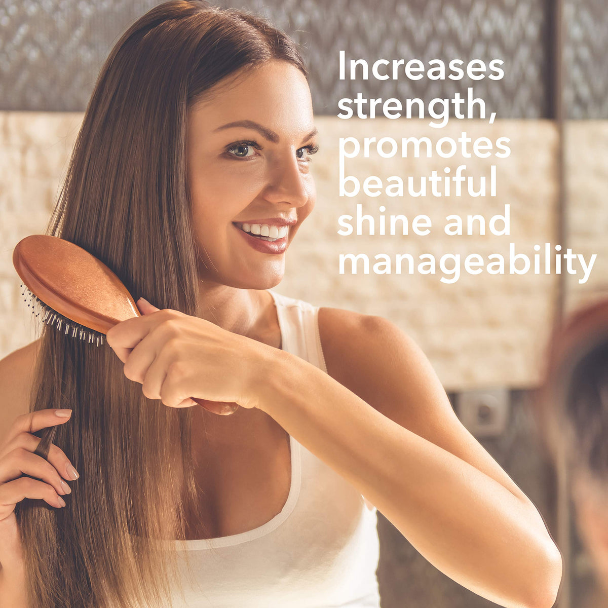 Macadamia Natural Oil Spray mist dispensing action highlights smooth frizz-control benefits.
