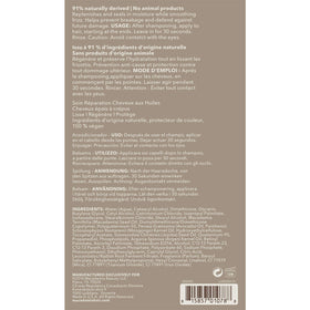 Back label shows vitamin blend for elasticity and strength.