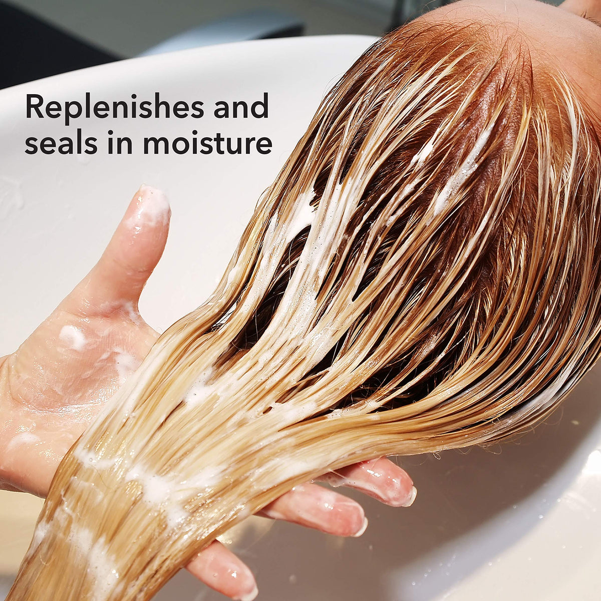 Texture detail emphasizes silky feel and nourishment for coarser hair.
