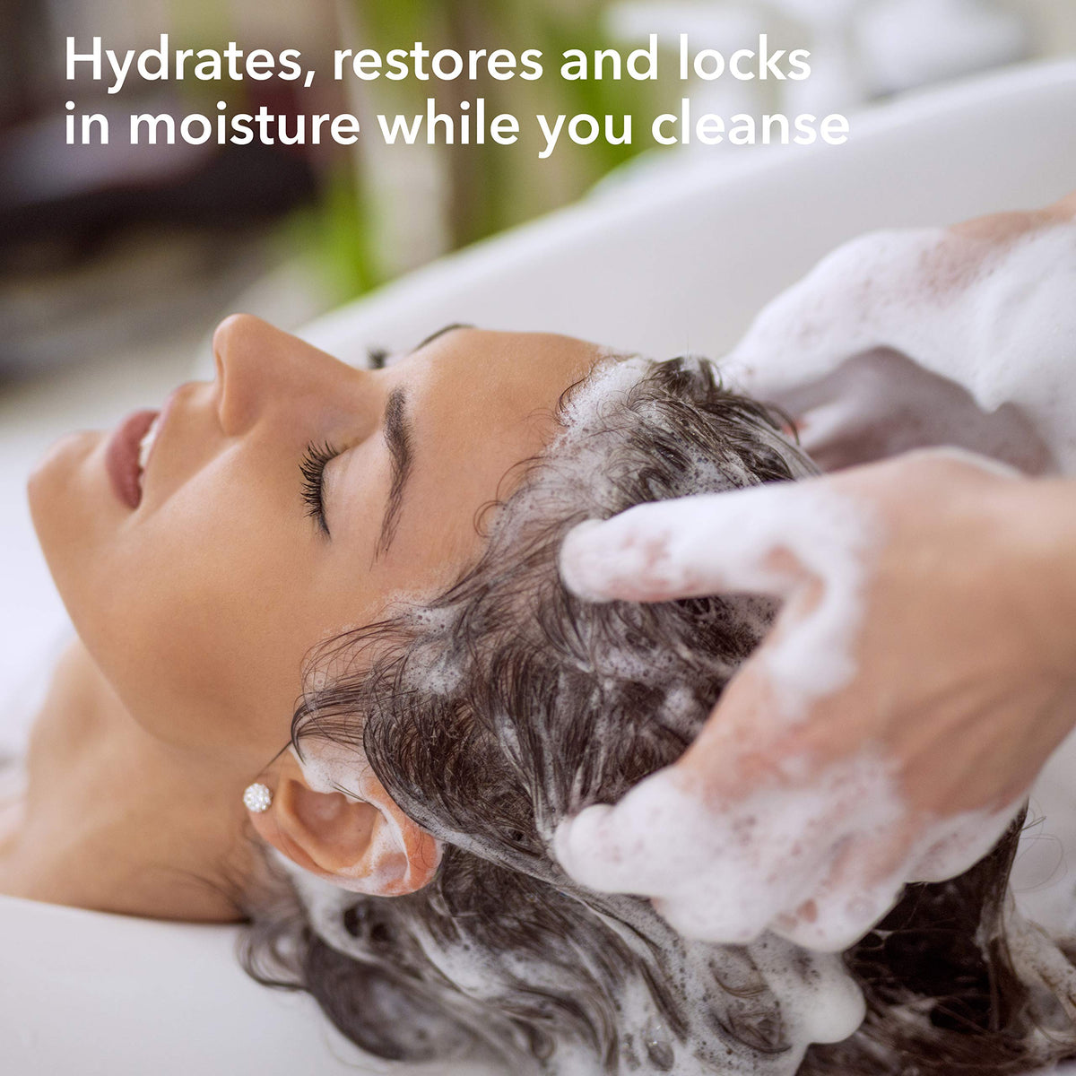 Creamy lather from Macadamia Professional Ultra Rich Shampoo on the hand.