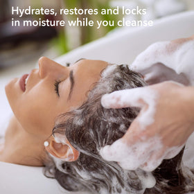 Creamy lather from Macadamia Professional Ultra Rich Shampoo on the hand.