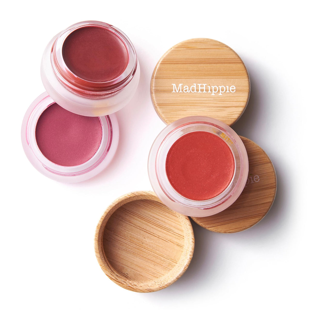 Apply Mad Hippie buildable color tint to cheeks for a natural flush that grows with layering.