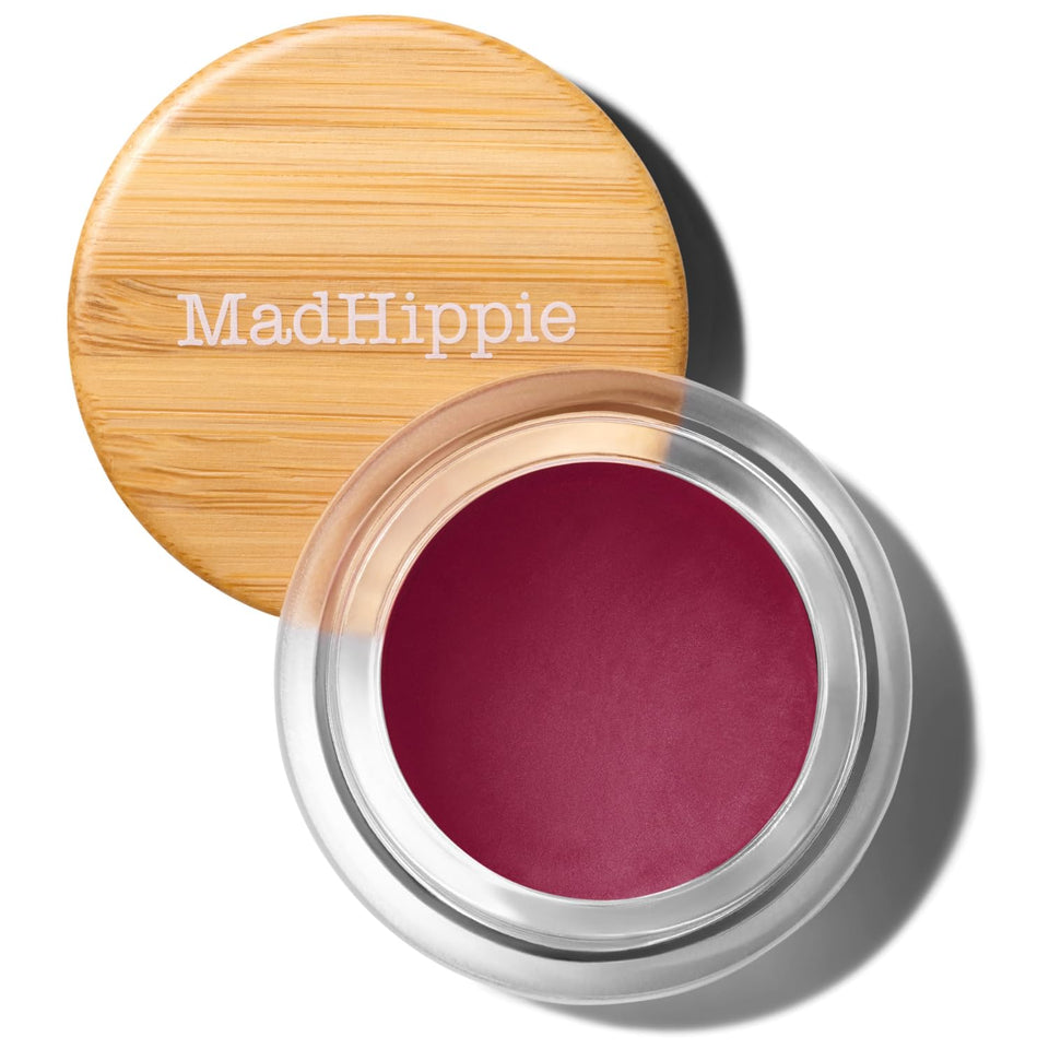 Mad Hippie Cheek & Lip Tint Plum in a compact jar for buildable color on lips and cheeks.