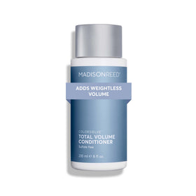 Madison Reed ColorSolve Total Volume Conditioner bottle front showing color-safe volumizing promise.