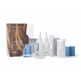 Lightening cream application with Wishbone tool for precise balayage