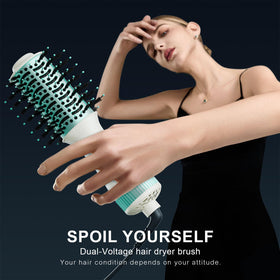 Madremía dual voltage travel hair dryer brush side view, ergonomic grip for easy styling.