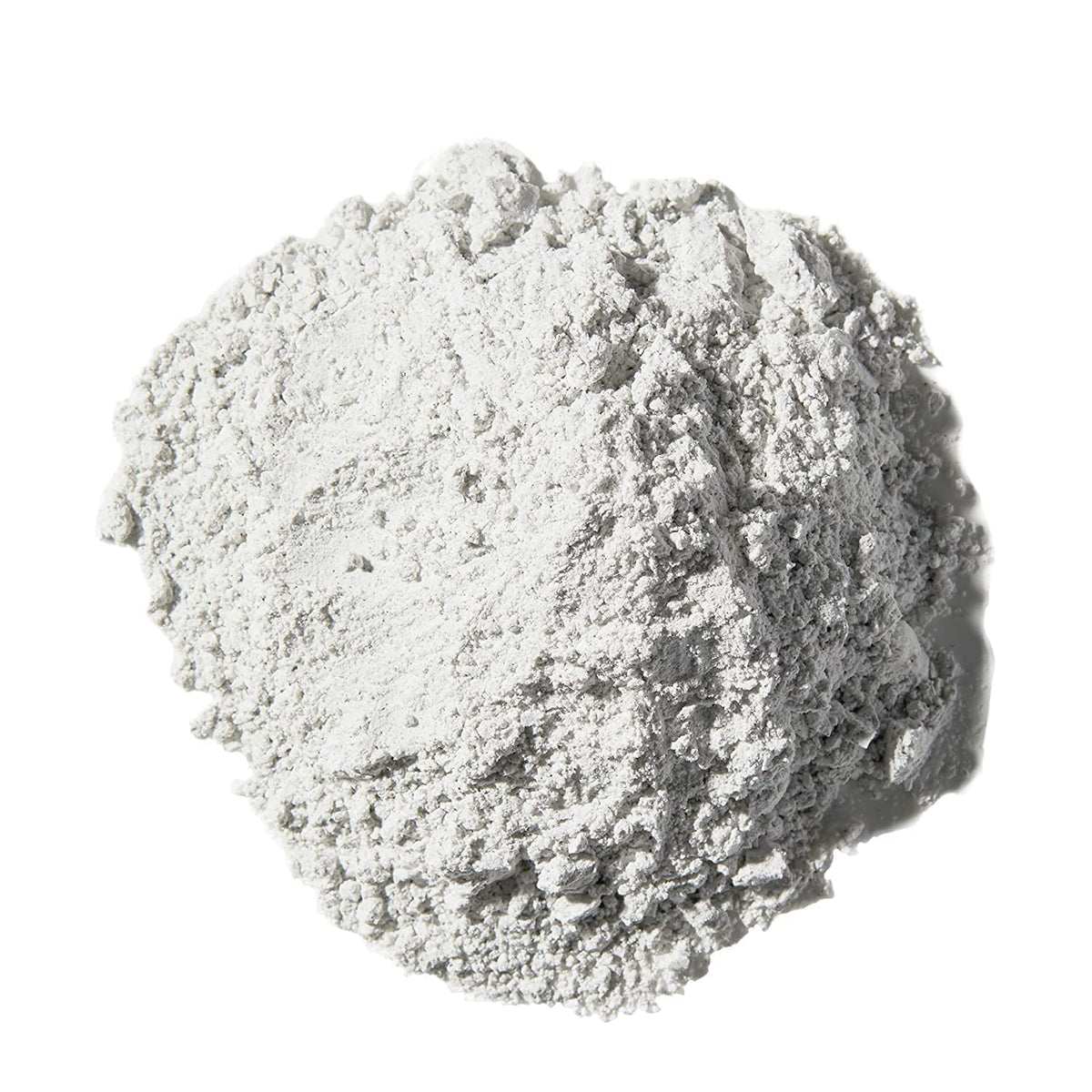 Magic Skin Conditioning Shaving Powder being mixed with water to form a smooth paste.