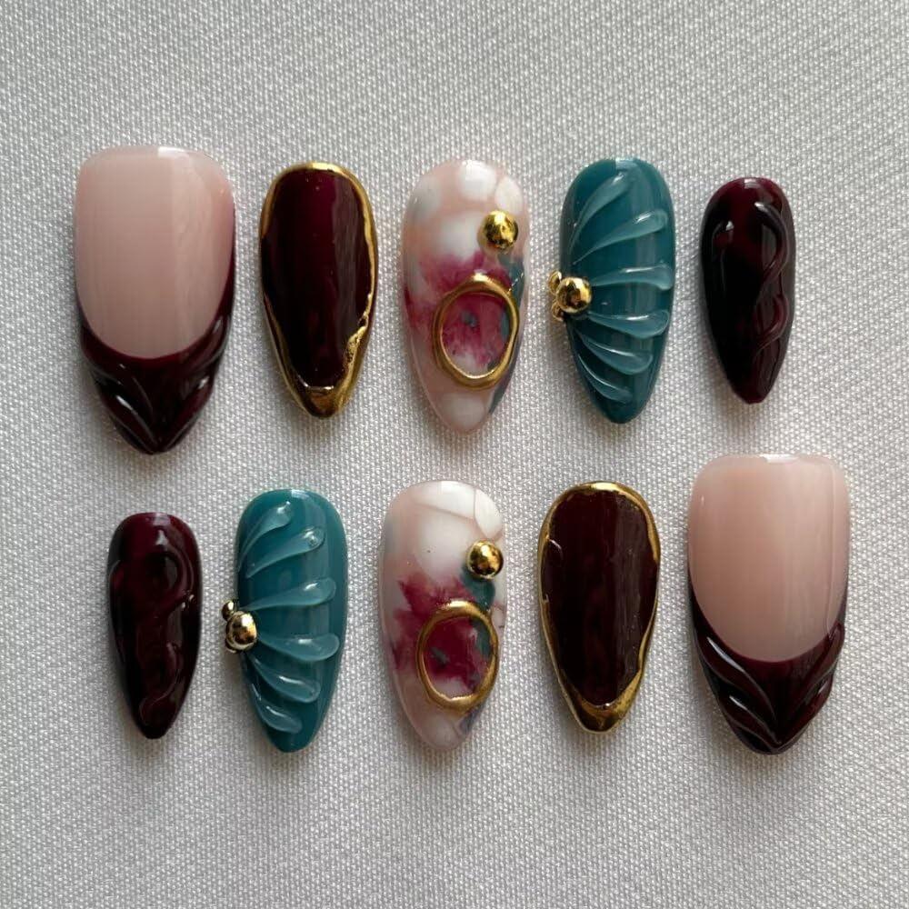 MAGLFELL Fall Press On Nails in almond shape with brown painting for a salon-ready look.