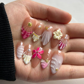 MAGLFELL almond 3D nails with french tip for chic, at-home manicure.