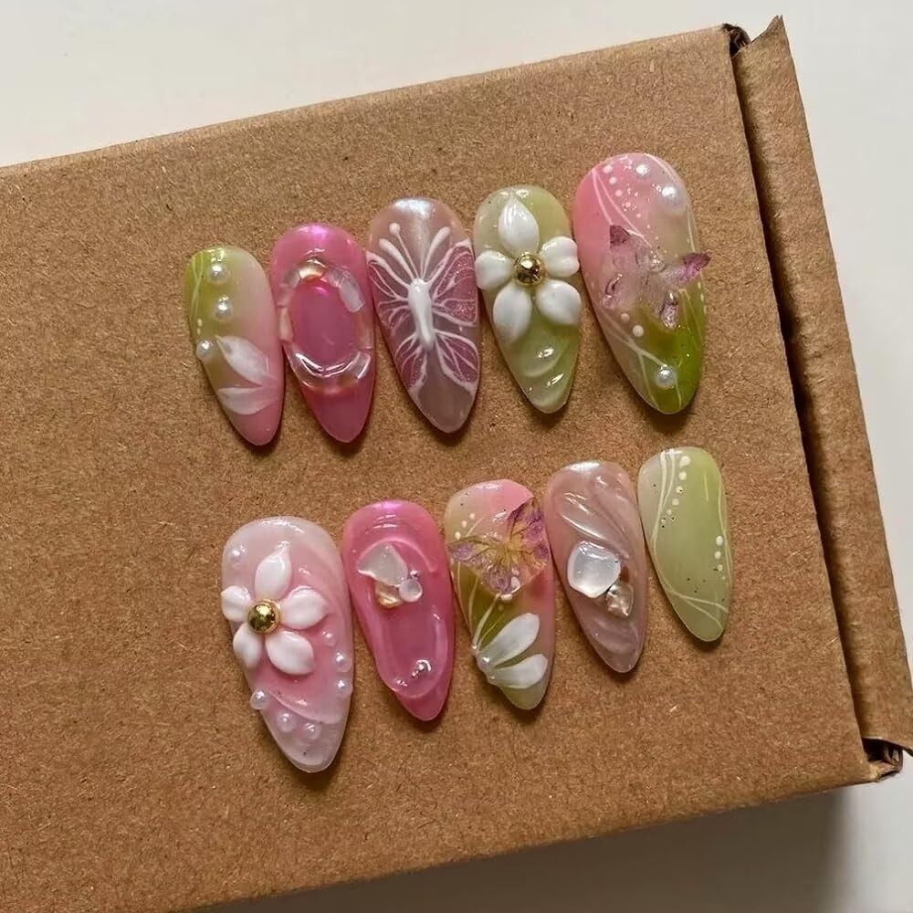 Maglfell press-on nails Medium Almond with a green-pink pattern for stylish DIY nails.