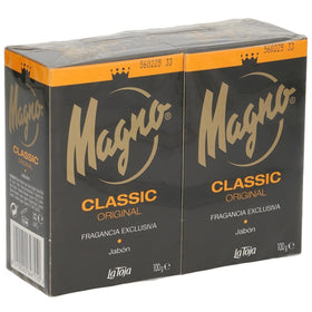 Magno Classic Black bar in hand for daily cleansing.