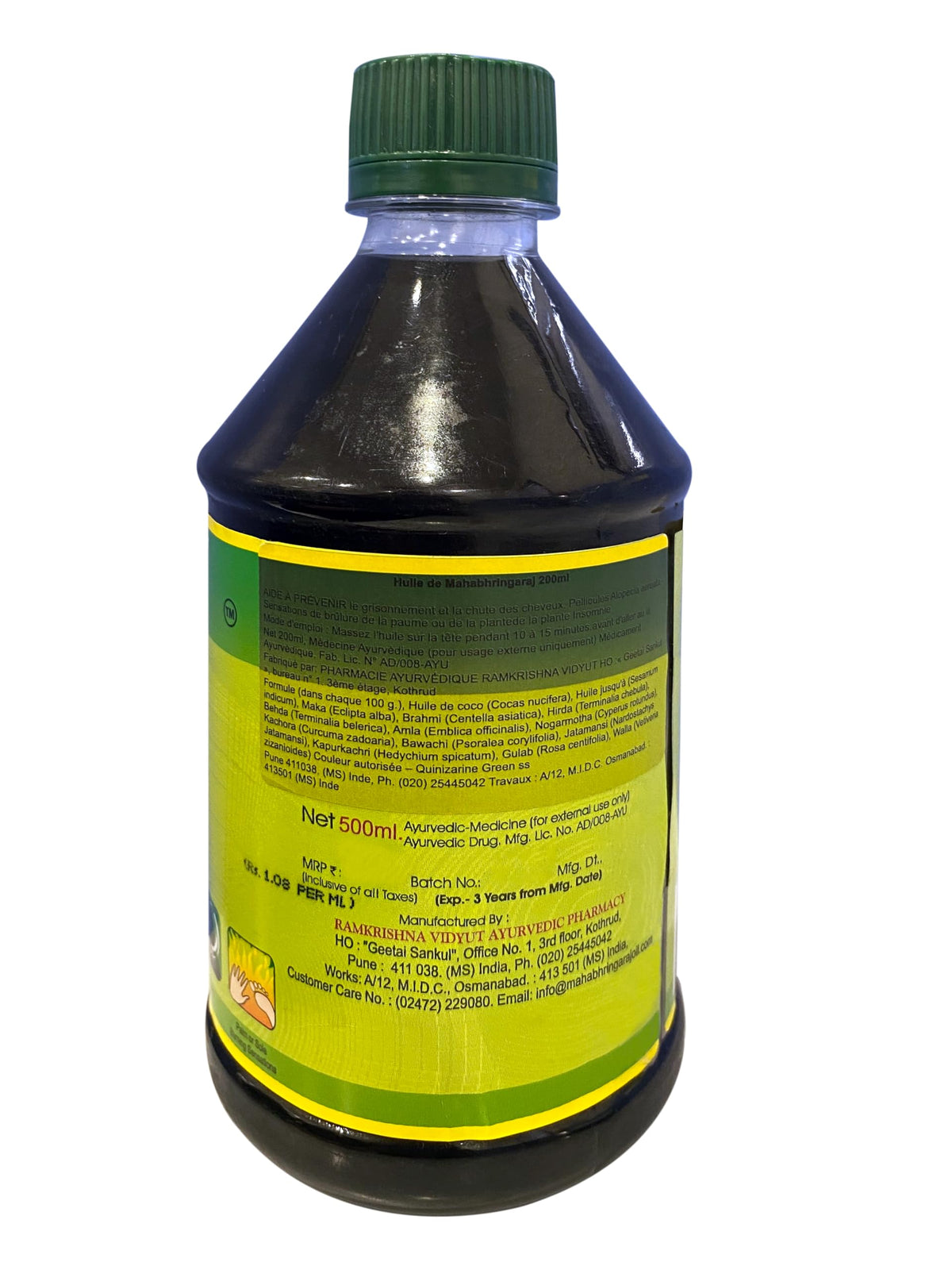 Mahabhringaraj Oil applied to scalp during massage demonstration for relaxation.