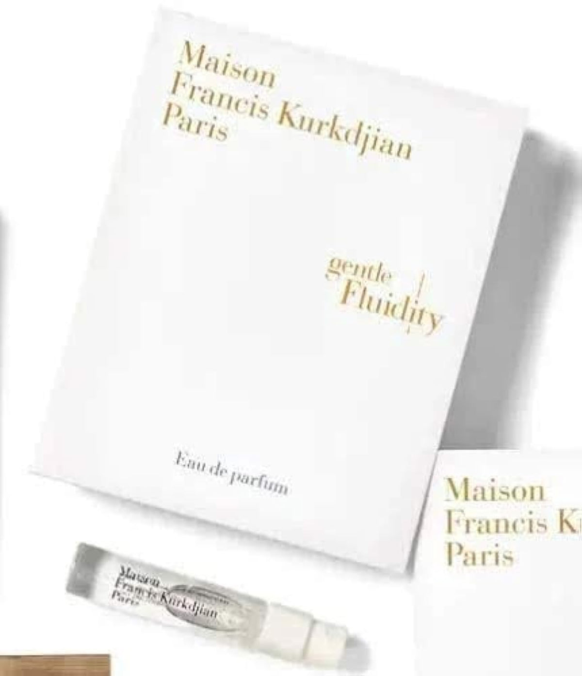 Maison Francis Kurkdjian Gentle Fluidity Gold 2ml bottle for testing.