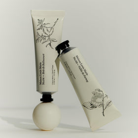 Maison Louis Marie No.04 Bois De Balincourt hand cream texture shown, hinting at rich hydration.