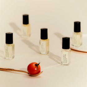 Nouvelle Vague roll-on bottle with soft glow and perfumed aura