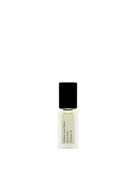 Maison Louis Marie Icila bottle close-up showing elegant roll-on design for on-the-go use.