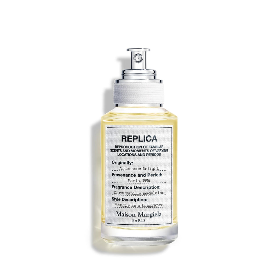 Maison Margiela Replica Afternoon Delight bottle showing warm vanilla and sandalwood notes.