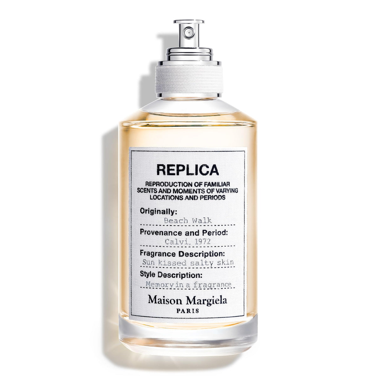 Maison Margiela Replica Beach Walk bottle on sand evokes warm summer strolls