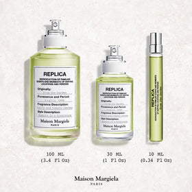 Maison Margiela Replica From the Garden bottle image emphasizes minimalist design and elegance.