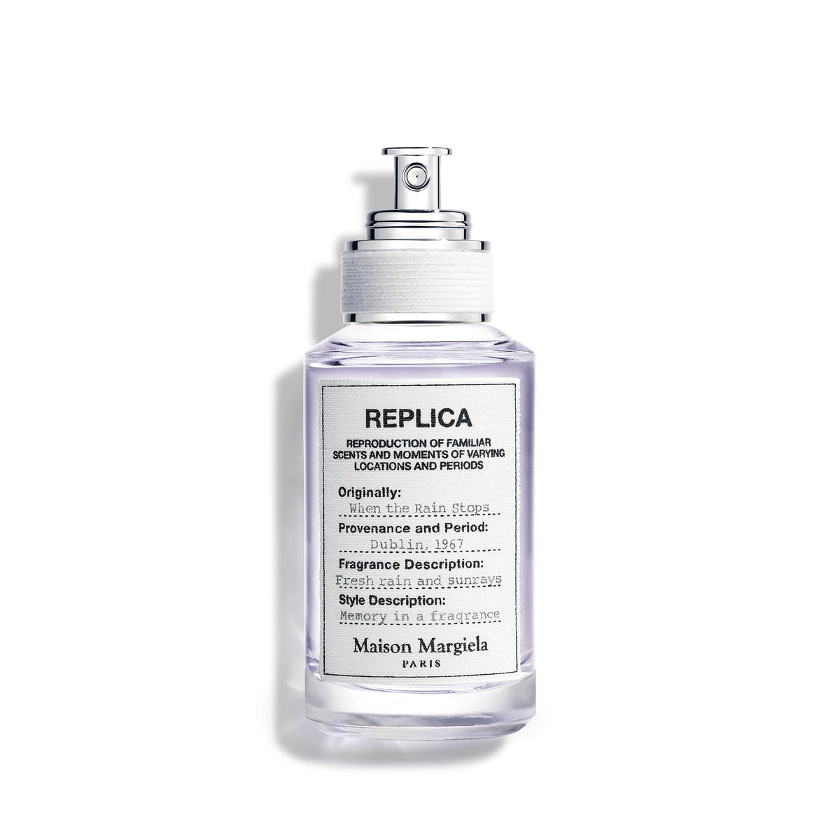Maison Margiela Replica When the Rain Stops bottle on a white surface, crisp aquatic freshness.