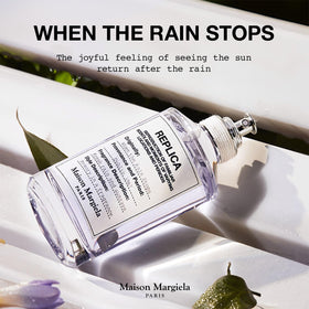 Bottle photographed against natural textures highlighting patchouli and floral notes.