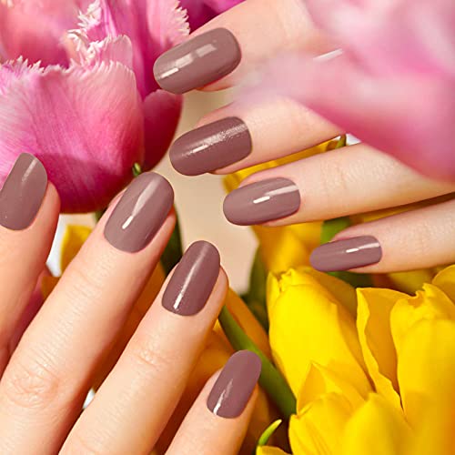 Maitys women nails decorated with stickers showcasing stylish designs