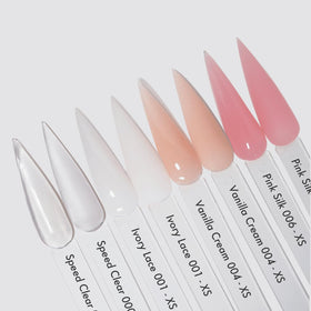 MakarttPro nude powder bottles arranged for professional nail art setups.