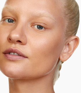 MAKE Beauty Skin Tint Diffusion Dew application swatch demonstrates buildable coverage.