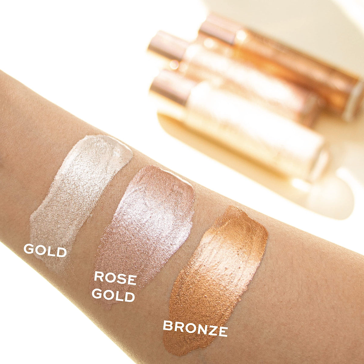 Makeup Revolution Molten Body Glow Rose Gold glow on skin with pink shimmer for glow-ready skin.