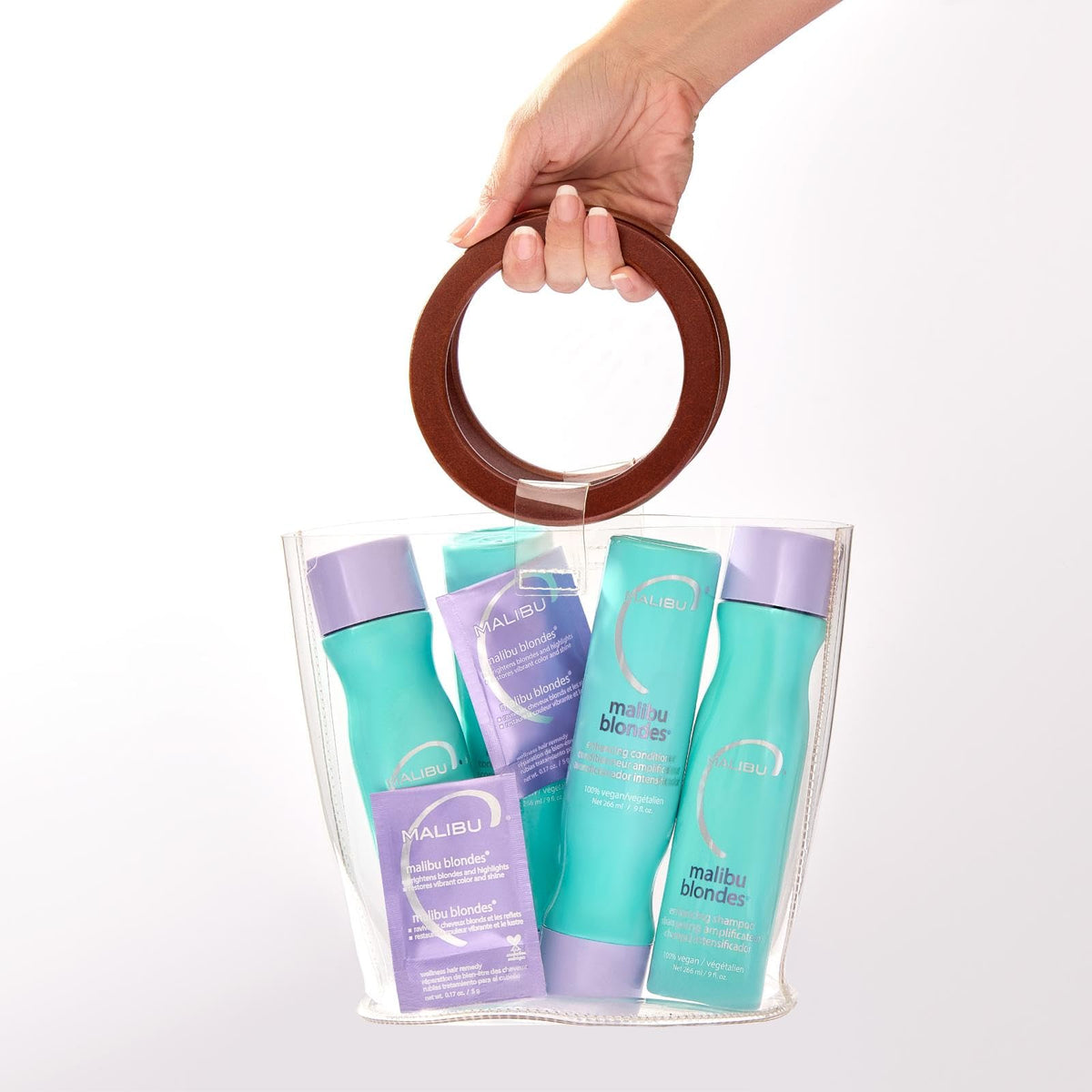 Bathroom scene with Malibu C conditioner suggesting salon-like results