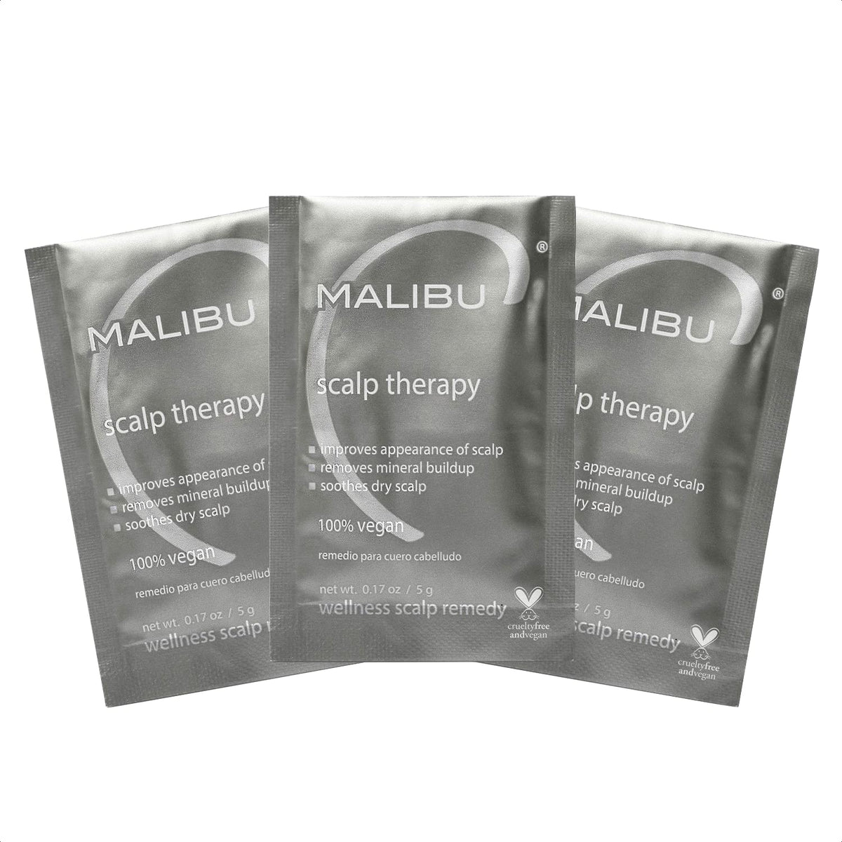 Malibu C Scalp Therapy crystals dissolving in hand for soothing scalp treatment