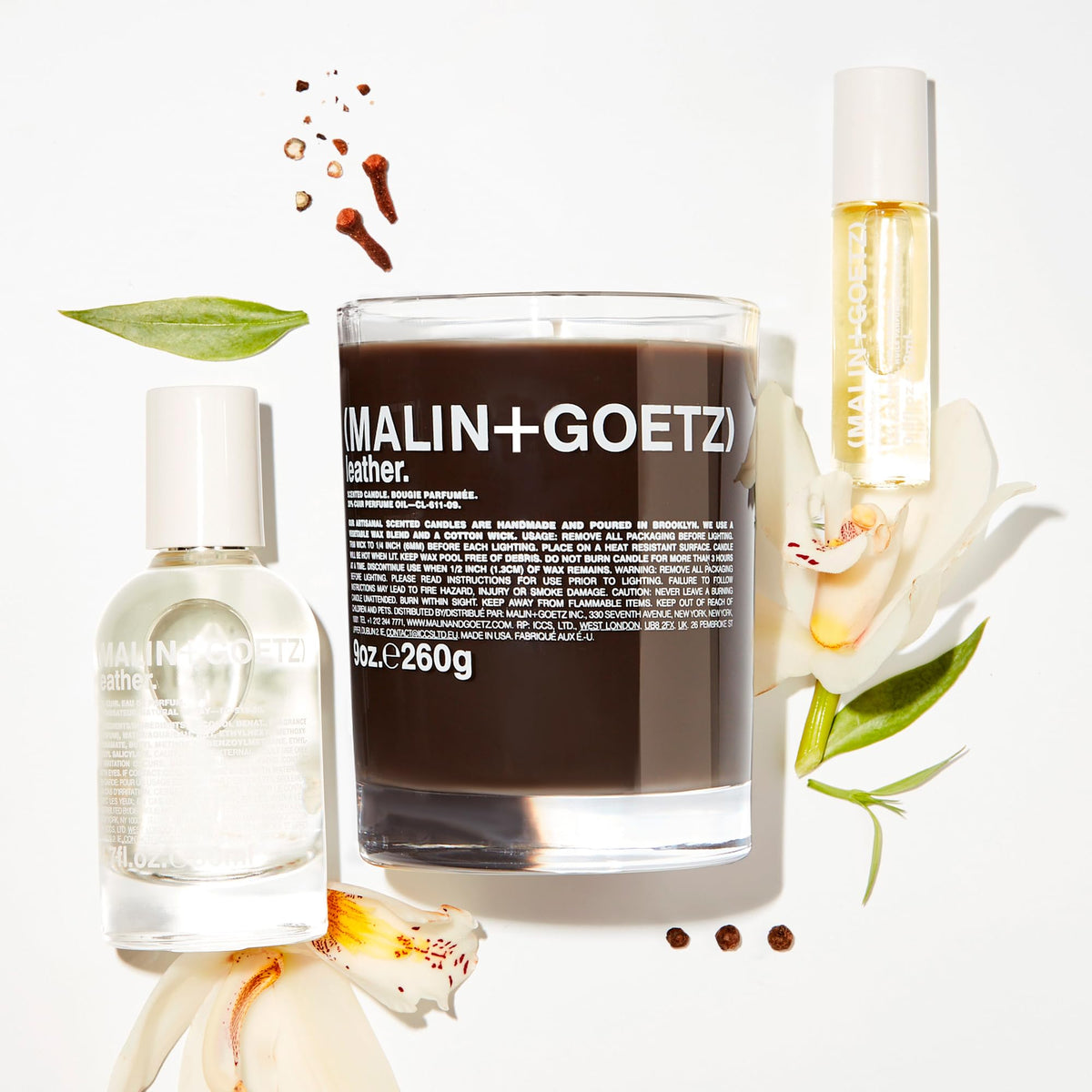 MALIN+GOETZ Leather Perfume Oil rollerball in use for daily touch-ups