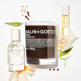 MALIN+GOETZ Leather Perfume Oil rollerball in use for daily touch-ups