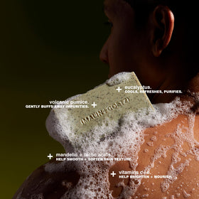 MALIN+GOETZ Mandelic Acid Bar pumice close-up shows physical exfoliation.