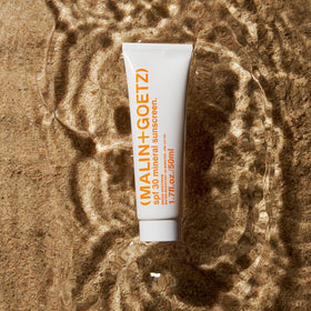 MALIN+GOETZ SPF 30 being applied for smooth, even coverage.