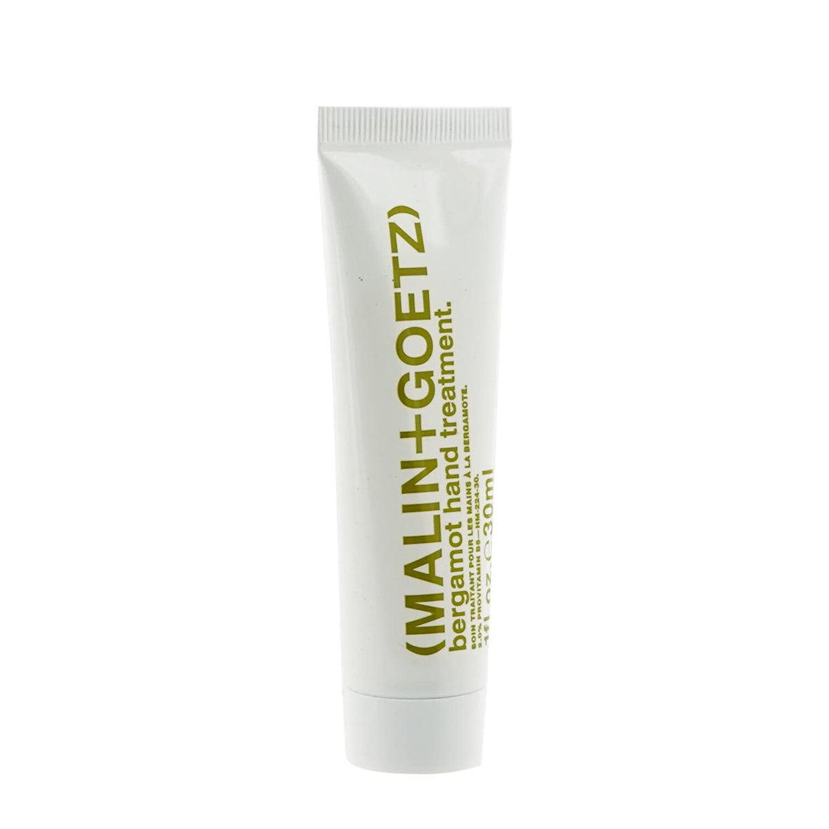 Malin+Goetz Vitamin B5 Hand Treatment hands applying for quick absorption