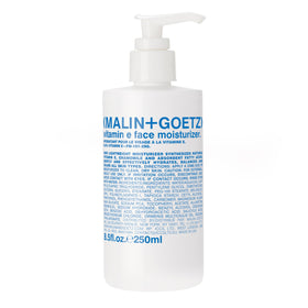 Malin+Goetz Vitamin E moisturizer bottle delivering lightweight hydration for all skin types.