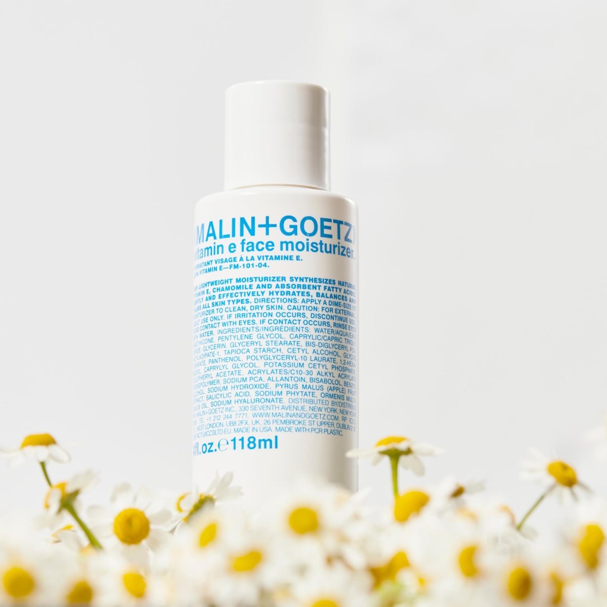 Moisturizer used as makeup primer for a smooth complexion by Malin+Goetz.