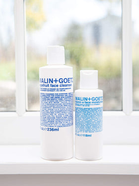 Vegan, cruelty-free packaging on Malin+Goetz moisturizer signals ethical skincare.