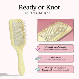 Mane birchwood paddle detangler showing durable design for styling
