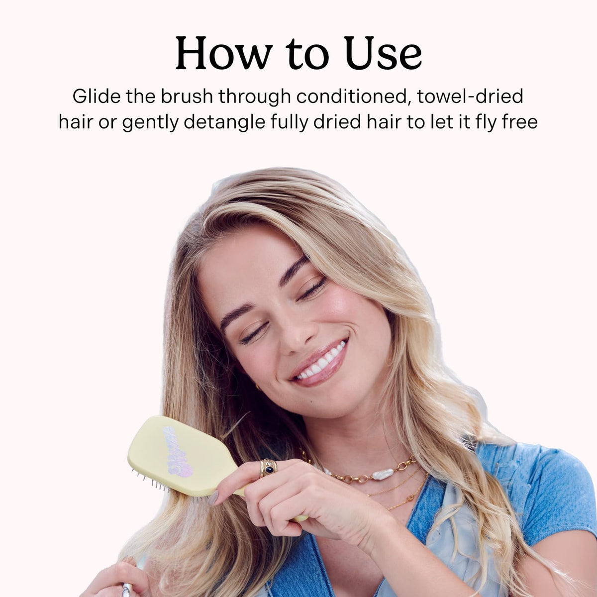 Mane Ready or Knot mini detangling brush birch wood handle with comfortable grip.