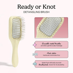 Mane Ready or Knot mini detangling brush metal bristles visible for scalp massage.
