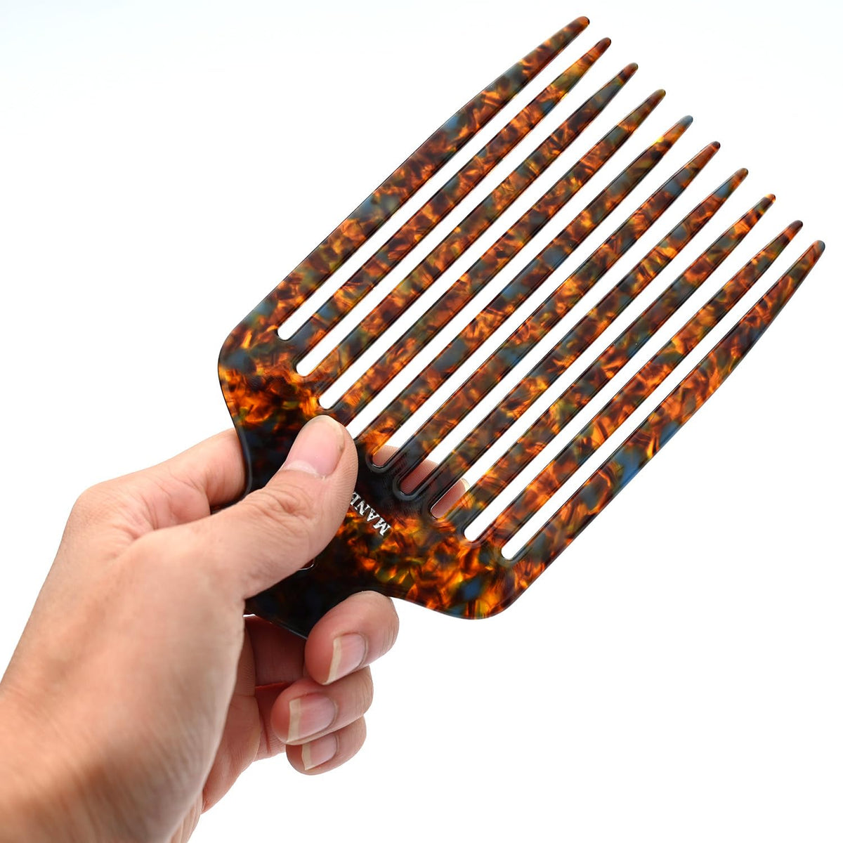 MANETURAL 15N teeth close-up shows smooth detangling in tortoise shell